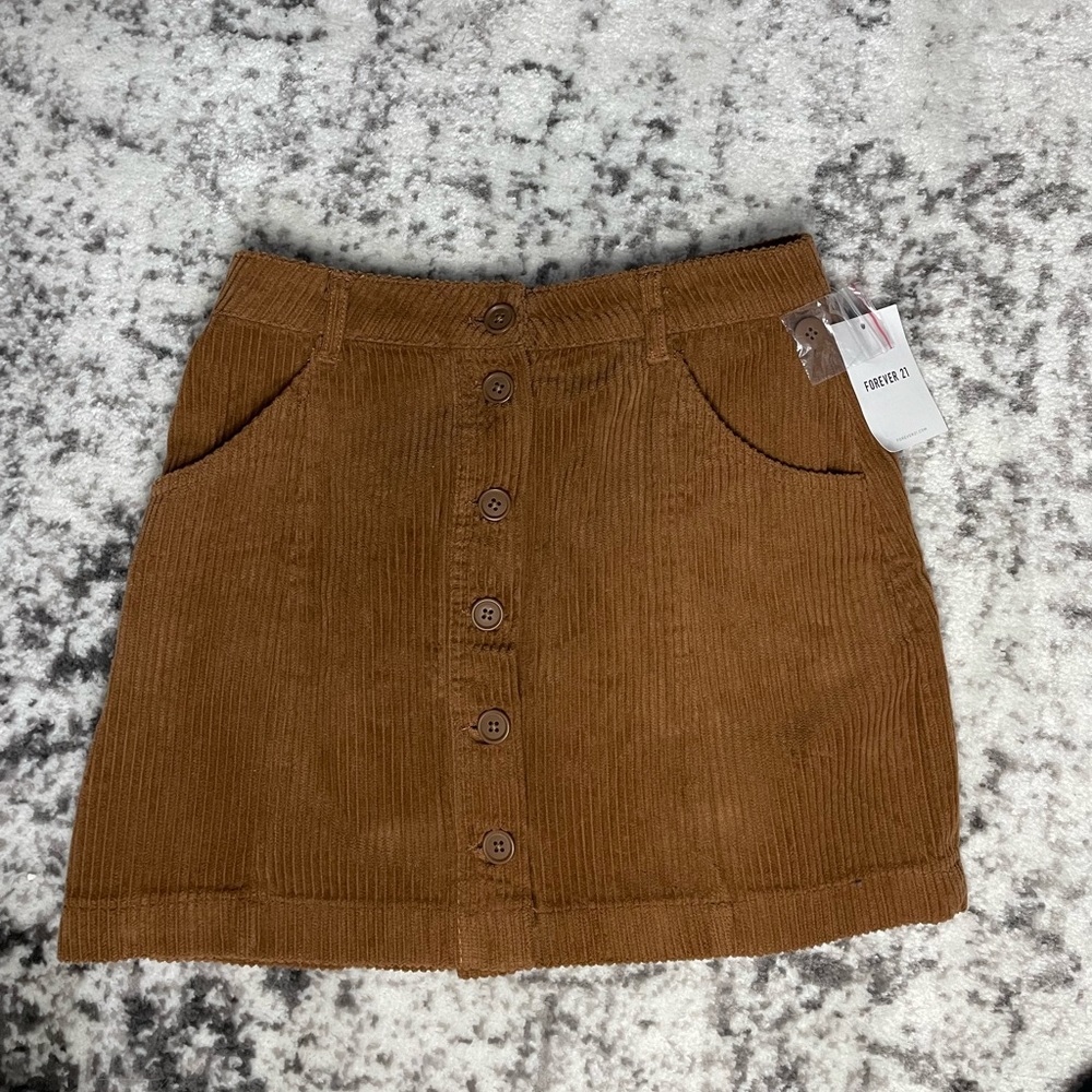 Brown corduroy skirt with buttons. Forever 21. Size small.